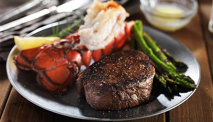 Surf turf, steak and lobster tail served at eclectic cuisine & lounge: Chefusion Restaurant and bar in Green Bay, Wisconsin